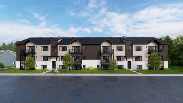 Vue extérieure d'un immeuble résidentiel moderne avec 2 chambres à Saint-Donat-de-Montcalm, offrant un environnement paisible et confortable pour les résidents.