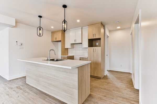 Appartement 3 chambres moderne à Sainte-Julienne, idéal pour famille ou investisseurs, avec cuisine équipée et espace lumineux.
