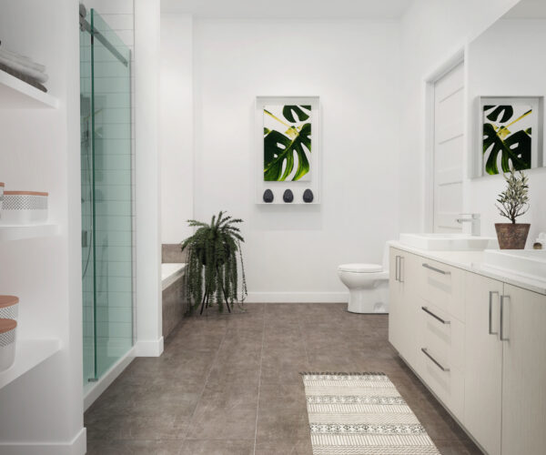 Salle de bain lumineuse avec douche en verre, meuble blanc, plantes et décoration végétale.