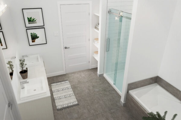 Salle de bain contemporaine avec douche en verre et baignoire dans un appartement de trois chambres à Sainte-Adèle.