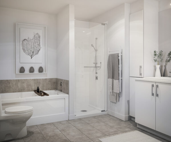 Appareil photo montrant une salle de bain contemporaine avec douche, baignoire, et mobilier blanc à Lachute, en août.