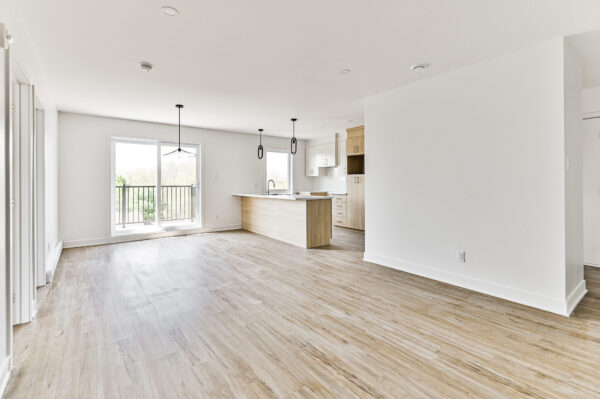 Appartement lumineux avec deux chambres à Sainte-Julienne, idéal pour famille ou jeunes professionnels, offrant un espace moderne et convivial.
