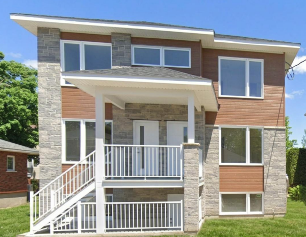 Appartement 2 chambres lumineux à Saint-Jérôme, idéal pour famille ou professionnel, avec espace extérieur et finitions modernes.