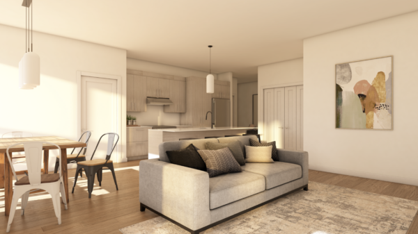 Vue intérieure d'un appartement de 2 chambres à Sainte-Agathe-des-Monts, avec salon moderne, cuisine ouverte et décoration élégante, idéal pour la gestion immobilière.