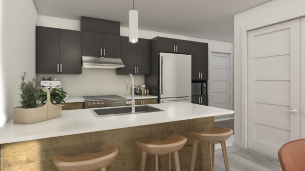 Cuisine moderne avec comptoir en quartz, armoires noires et appareils en acier inoxydable dans un appartement de Saint-Jérôme, parfait pour un logement confortable en août.